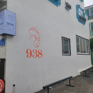 938